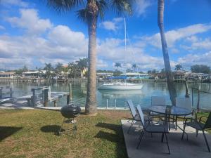 Oasis Waterfront Treasure Island Condo with Patio Dock and Johns Pass
