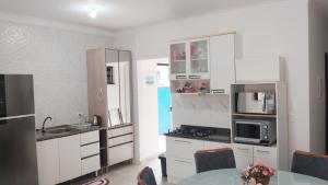 Casa com 2 quartos, ar condicionado e pet friendly