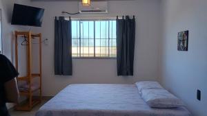 Studio completo, Ar, Tv, Wifi, perto de tudo