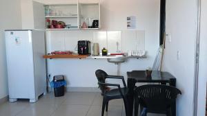 Studio completo, Ar, Tv, Wifi, perto de tudo