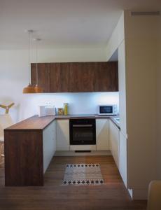 Priestranný dizajnový 2-izbový byt v centre Trnavy s výhľadom na mestskú vežue