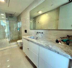 Bright Three-Bedroom Condo With Ocean View and Resort Amenities