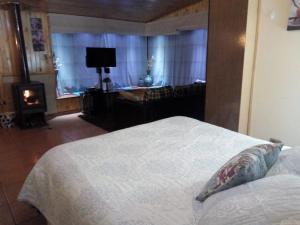 Cabaña Familiar con Jacuzzi Pétalos VillarricaTranquilidad a Minutos del Lago