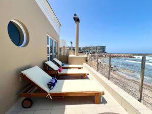 Live Beachfront in Swakopmund at Waterfront Cottage C1