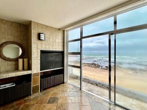 Live Beachfront in Swakopmund at Waterfront Cottage C1