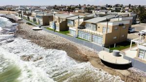 Live Beachfront in Swakopmund at Waterfront Cottage C1