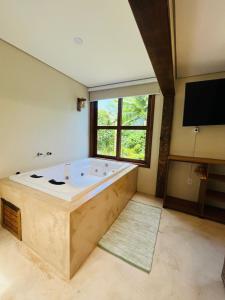 Studio com Jacuzzi na Natureza Casal Baoba Suite