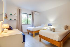 Relaxing 2BD Apt 500m Beach w AC WiFi Pool