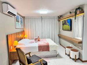 Magnífico APARTAMENTO de Charme - 3 quartos AR CONDICIONADOS SPLIT - Beira Mar, 2 banheiros, 2 Vagas Garagem, 4 Varandas, 2 Elevadores, Redes para Descanso, Wi-Fi, Air Fryer, Disney Plus, HBO Max, Guarda Sol, Cadeiras de Praia e Caixa Térmica