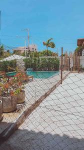 Casa à 70m da praia com 9 quartos sendo 7 suítes