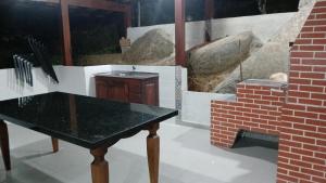 Casa em frente a Cachoeira do Tobogã