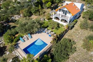 The Captains House heated pool, sea views