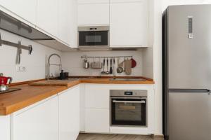 GuestHost - Lovely Flat near Frattini M4