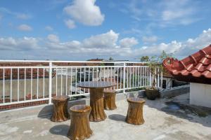 Urbanview Hotel Arta Guna Casa