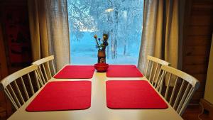 Log cabin on the banks of Ounasjoki River