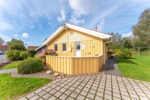 4 Personen Ferienhaus mit Sauna, Kaminofen und einen wunderschцnen Garten mit Terrasse in Otterndorf