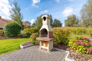 4 Personen Ferienhaus mit Sauna, Kaminofen und einen wunderschцnen Garten mit Terrasse in Otterndorf