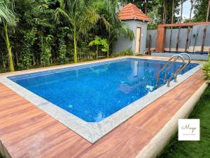 Lotus Serenity by MagoStays -2BR Pool Property