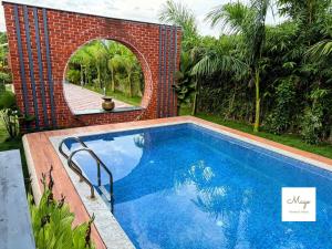 Lotus Serenity by MagoStays -2BR Pool Property