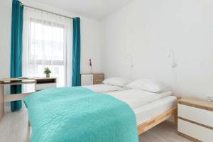 Comfortable Apartment with Access to the Gym and Parking by Noclegi Renters