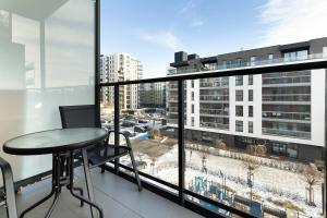 Comfortable Apartment with Access to the Gym and Parking by Noclegi Renters