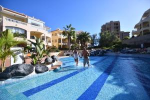 A bright apartment with a pool