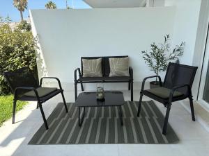 Nuevo bajo con gran jardín en primera línea playa