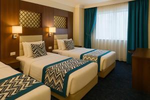 فندق تريبل ون