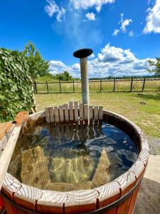 Mini cabaña con tinaja