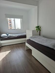 Spacious 3BR Apartment with Terrace 300m Beach