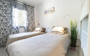 Modern Duplex in Sitges with Private Parking, Sea Views & Terrace