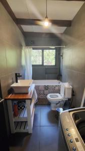 Cabaña en la playa con bosquecito