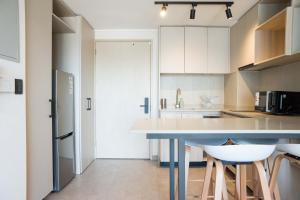 Cozy 1BR Getaway for Three in Vibrant Nunoa