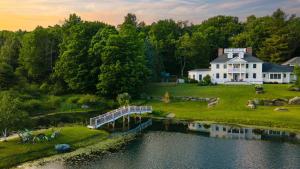 Secluded Estate w Private Pond Playroom Gym Movie Theater Sunny Pond by AvantStay