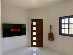 Feel at home 450 meters from Bertioga beach