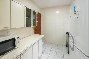 Apto c Churrasqueira a 350m da Praia ILH0503