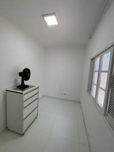 Casa espaçosa na Praia com Wi-Fi, Tv e 2 vagas de garagem