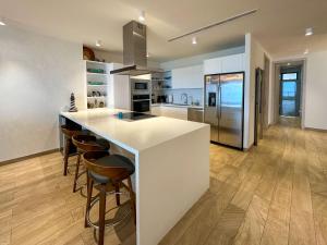 Stunning 3rd Floor Beachfront Condo