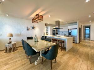 Stunning 3rd Floor Beachfront Condo