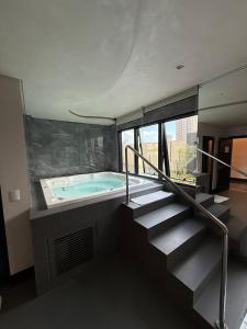 Lindo Flat na rua da Praia - Meia Praia Itapema