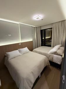 Lindo Flat na rua da Praia - Meia Praia Itapema