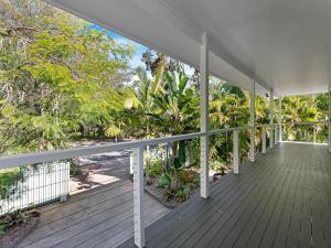 The Palms - Beach Retreat with Pool Garden BBQ