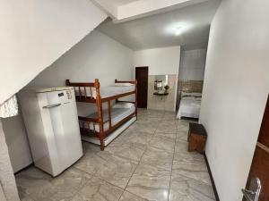 Casa Lunar no Ed Planeta Verde coração da vila perto das praias