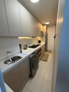 Apartamento mobiliado pé na areia na praia do Tabuleiro em Barra Velha SC