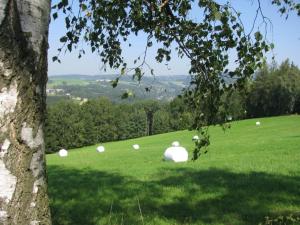 Holiday home in a quiet, authentic mountain village with a view of the surrounding hills