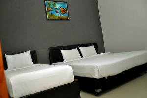 Purnama Mulia Hotel by 58 atroomS