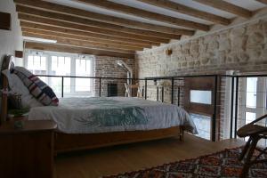 Bright studio with equipped kitchen and mezzanine