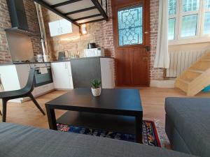 Bright studio with equipped kitchen and mezzanine