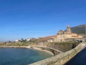 Tiny house with sunset over the ocean