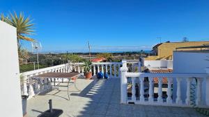 House overlooking the sea and pine trees